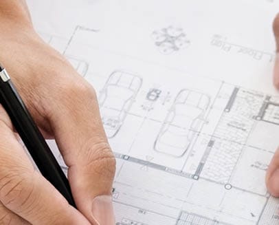 Close-up Of Person's engineer Hand Drawing Plan On Blue Print with architect equipment, Architects discussing at the table, team work and work flow construction concept.
